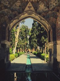 Trees seen through archway