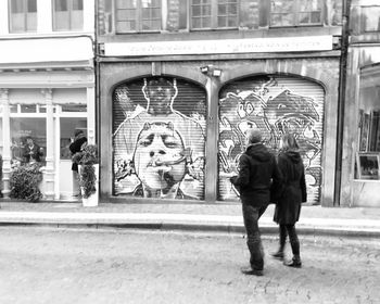 Full length of woman standing in city