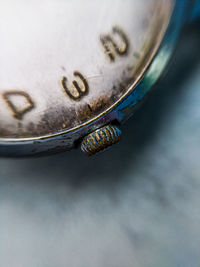 Close-up of clock against black background