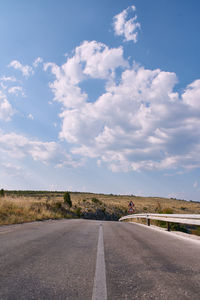 Empty road against sky