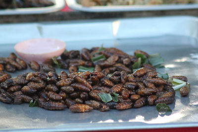 Close-up of roasted meat in plate on table