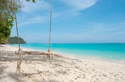 Wooden swing hang at koh phak bia island, krabi, thailand. 