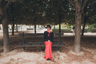 Full length of woman standing in park
