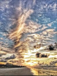 Scenic view of sea against cloudy sky