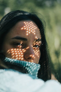 Portrait of woman against trees