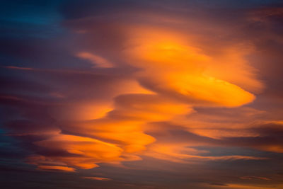 Low angle view of cloudy sky during sunset