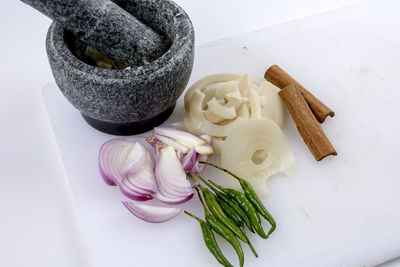 High angle view of chopped vegetables on cutting board