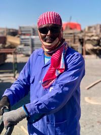 Portrait of man standing outdoors