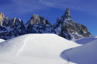 Snow covered mountain against sky