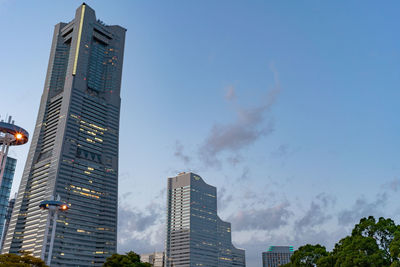 Low angle view of modern buildings against sky