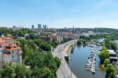 High angle view of river amidst buildings in city