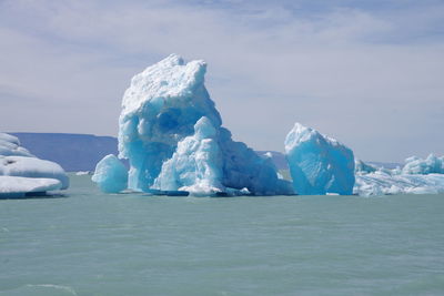 Scenic view of frozen sea against sky