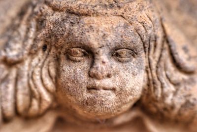 Close-up of old angel sculpture