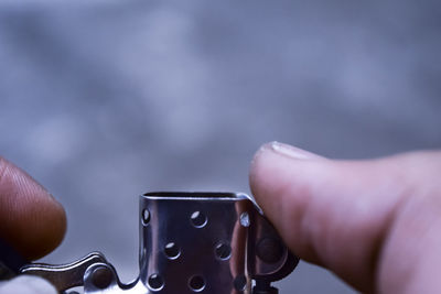 Close-up of hand holding smart phone