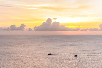 Scenic view of sea at sunset