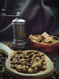 Close-up of coffee beans on table