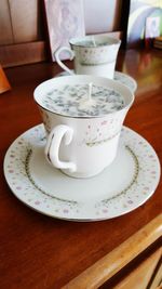 Close-up of coffee cup on table