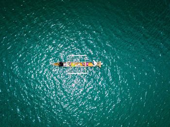 High angle view of people sailing in sea