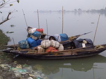 Fishing boat moored in lake