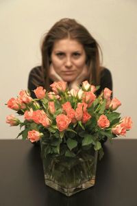 Portrait of woman with flowers