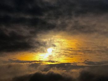 Low angle view of dramatic sky at sunset