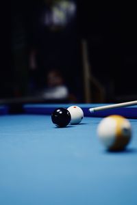 Cropped hand playing pool