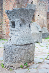 Stone wall against brick wall