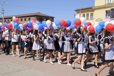 Group of people on street in city