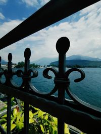 Close-up of railing against sea