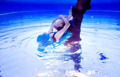 People swimming in pool