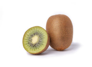 Close-up of fruits against white background