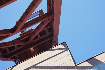 Low angle view of buildings against blue sky