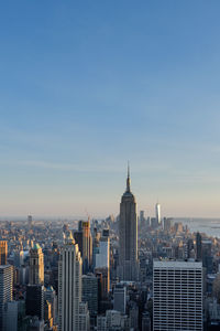 Modern buildings in city against sky