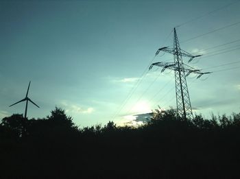 Low angle view of electricity pylon