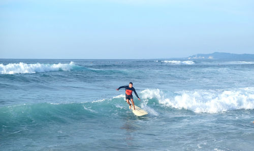 Surfing through the waves