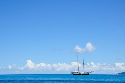 Sailing yacht cruise in the blue sea and sky