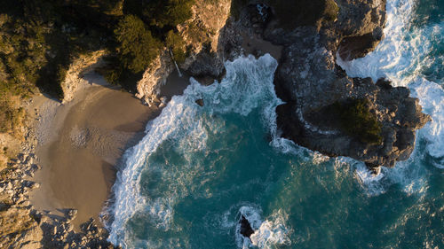 Scenic view of rocks in sea