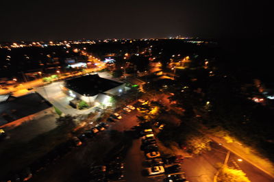 High angle view of illuminated city at night