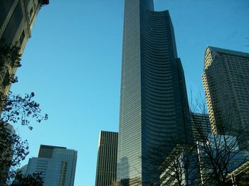 Low angle view of modern building against clear sky