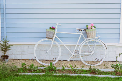 Bicycle parked by building