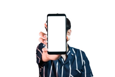 Man using smart phone against white background