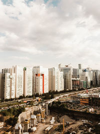 Buildings in city against sky