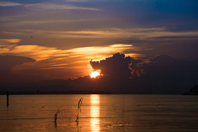 Scenic view of sea against sky during sunset