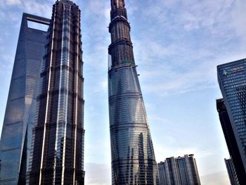 Low angle view of skyscrapers against sky