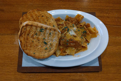 High angle view of breakfast served on table