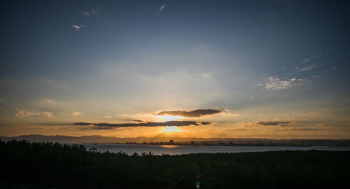 Scenic view of silhouette landscape against sky during sunset