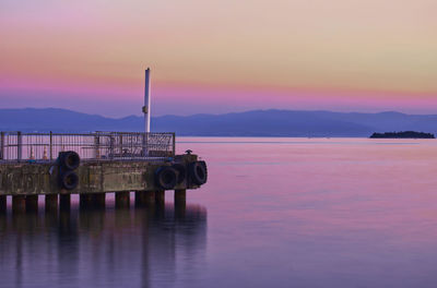 Scenic view of sea against sky at sunset