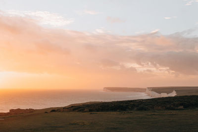 Scenic view of sea against sky during sunset