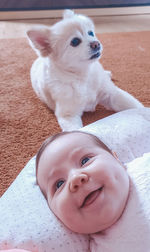 Portrait of a baby and dog 
