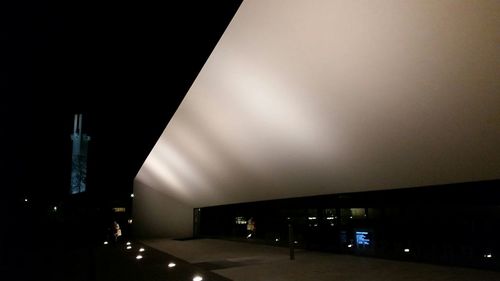 Low angle view of illuminated building at night